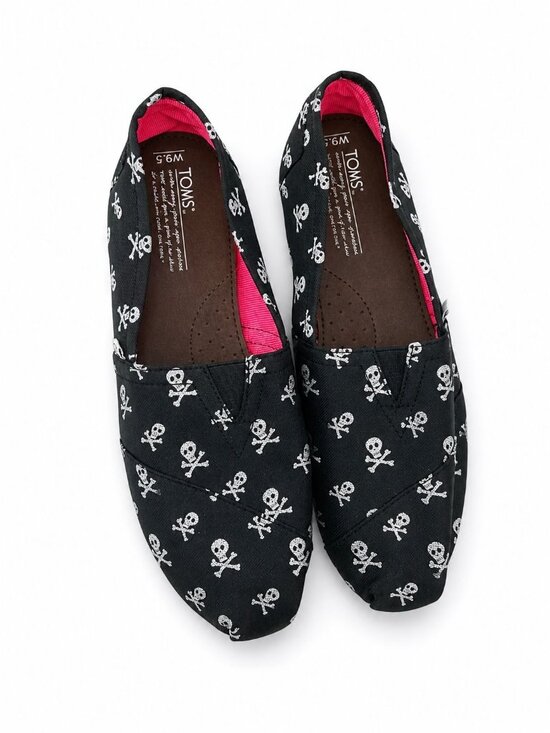 Toms Shoes - Tom’s classic size W 9.5 Black Silver Sarkle Skulls slip-on NEW